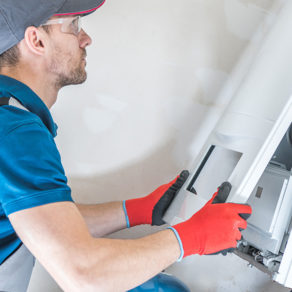 Technician repairing furnace in Valparaiso, IN