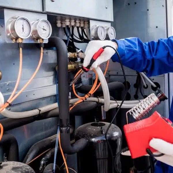 Technician checking the HVAC system